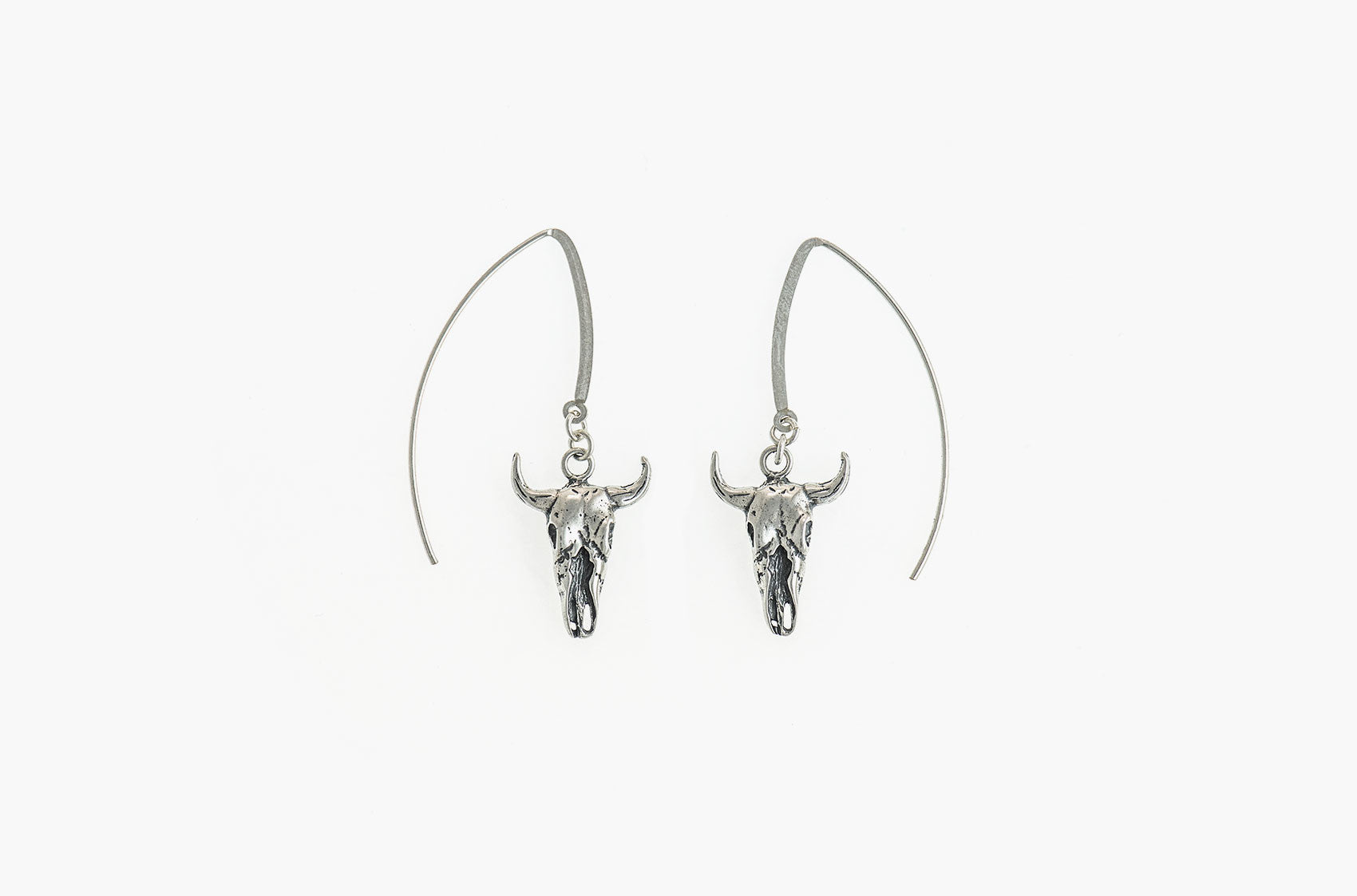 Artisan steer-skull earrings