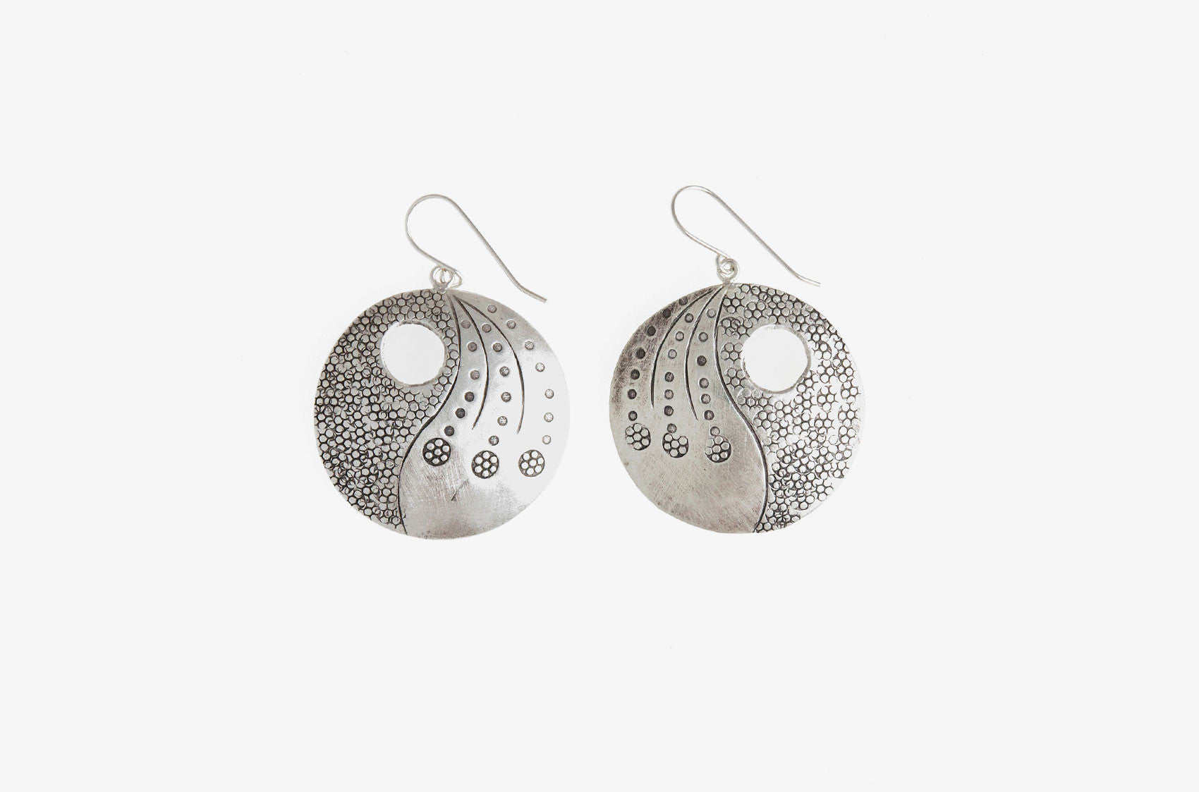 Big Wheel silver statement earrings