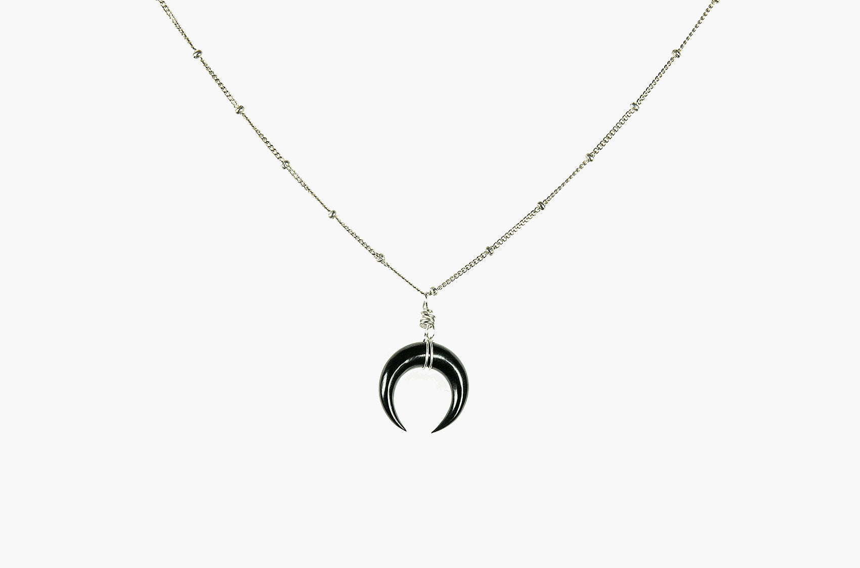 Little Big Horn. Mini crescent necklace black with silver