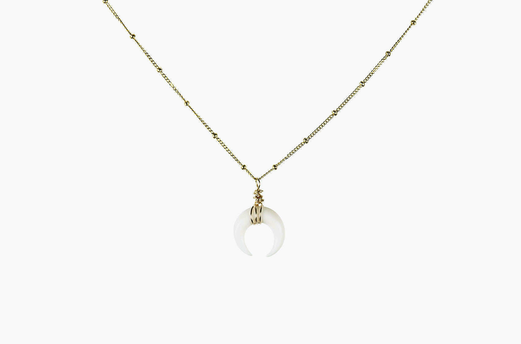 Little Big Horn. Mini crescent necklace ivory with gold