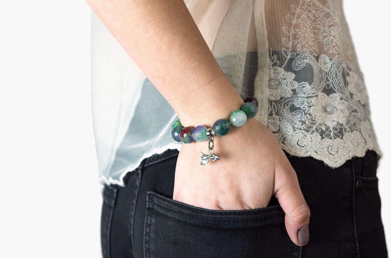 Model wearing Silver & Stone. Green Malay jade and silver bracelet