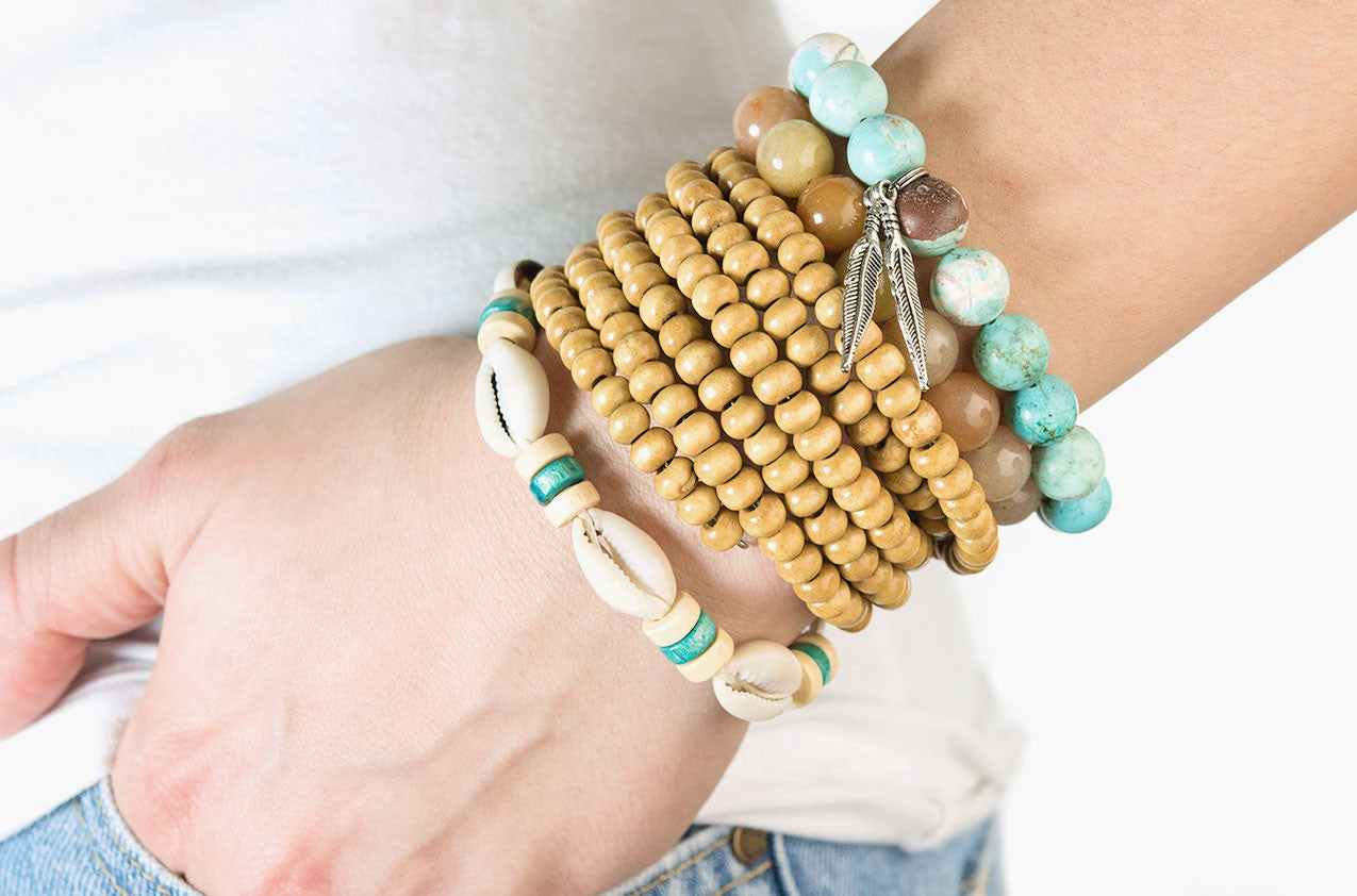 Model wearing Stacked or Separate Bracelet Collection No. 5