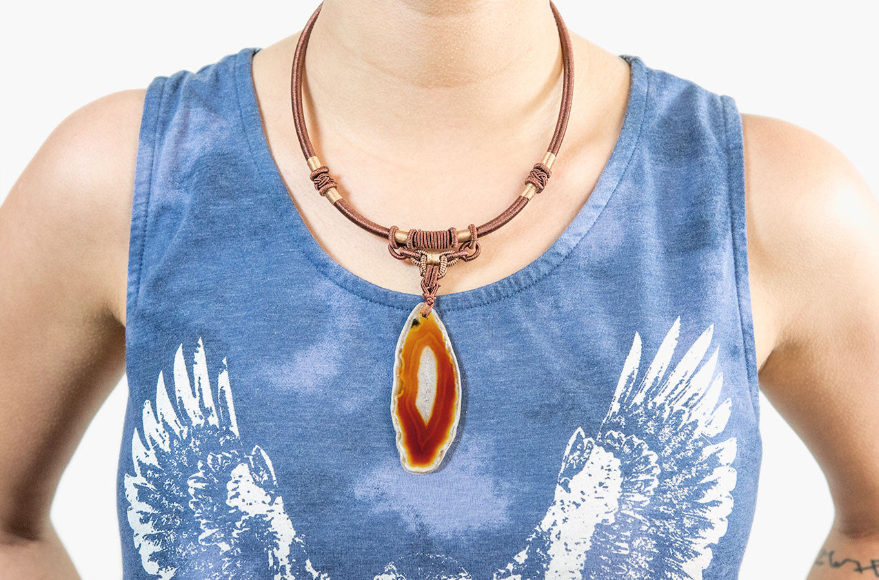 Model wearing Tribal woven necklace with agate pendant