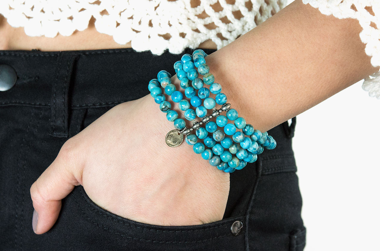 Model wearing Turquoise agate five-tier bracelet