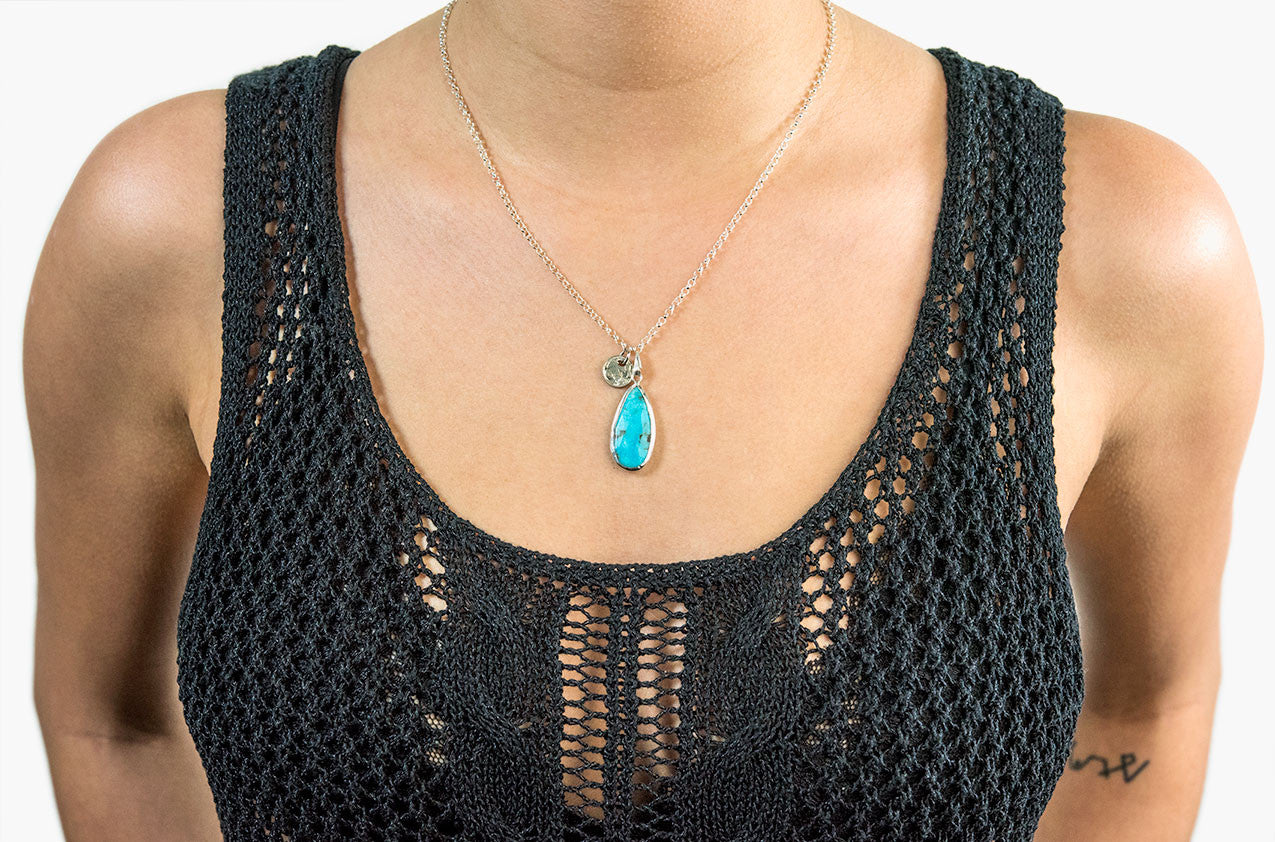 Model wearing Turquoise Tears pendant necklace
