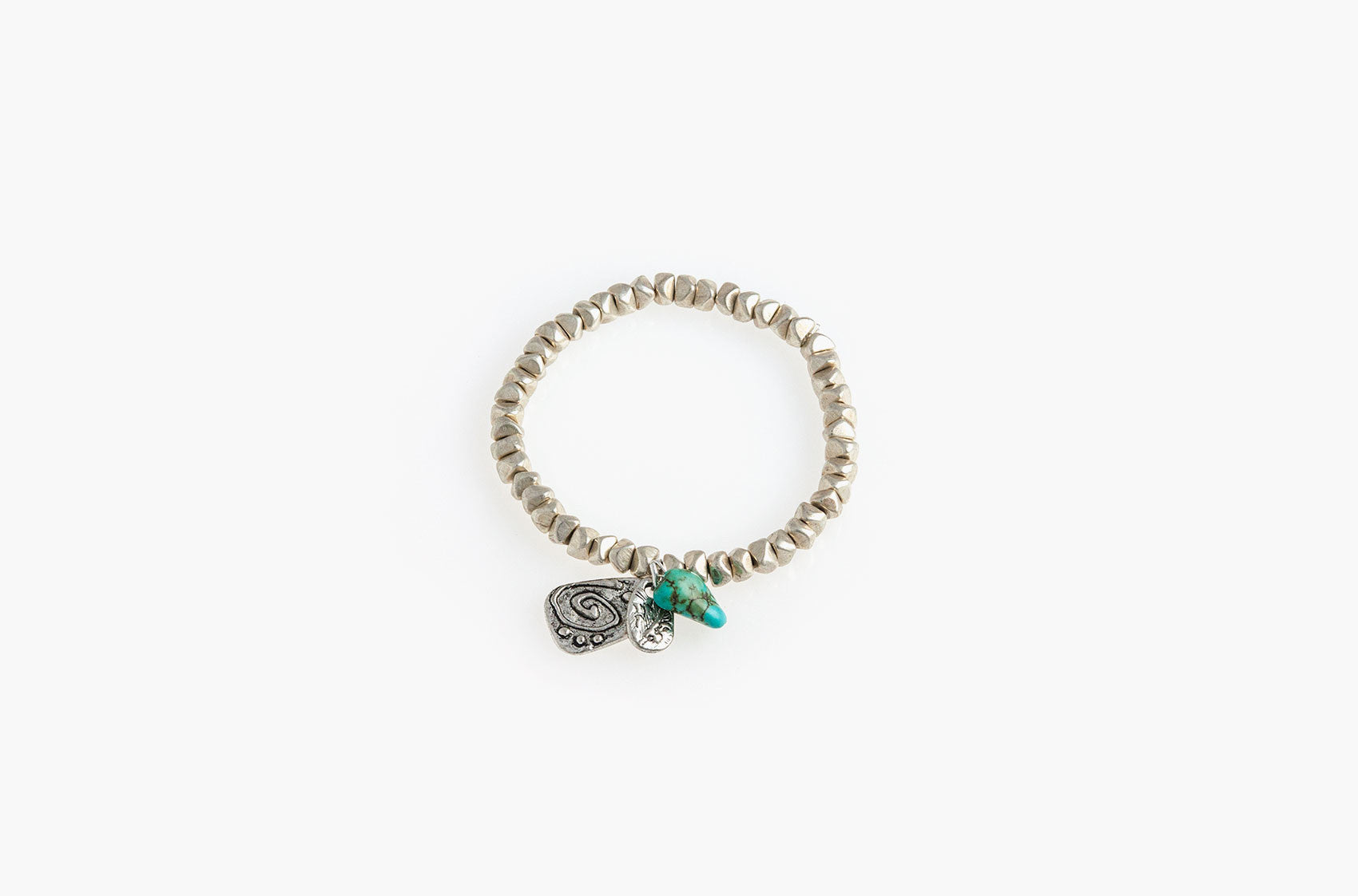 Silver nuggets, turquoise and charms bracelet