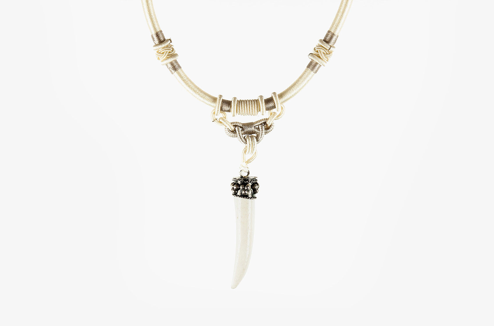Tribal woven necklace with bone spike pendant